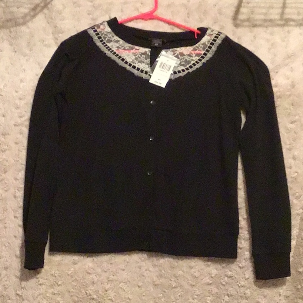 Black cardigan with white lace